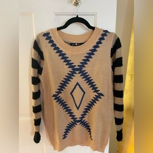 Statement Winter sweater for elevated lounging or dressing up. Warm and cute